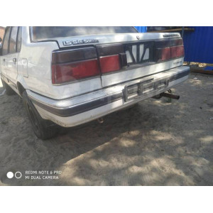 Бампер задний Toyota Corolla AE80 седан в Омске