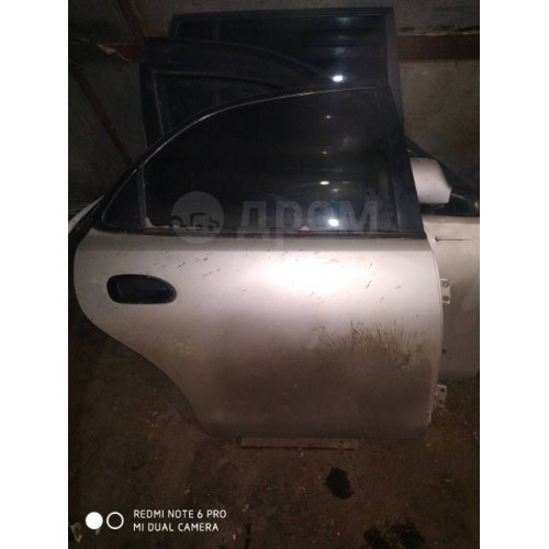 Дверь задняя правая Mazda Familia BH седан в Омске